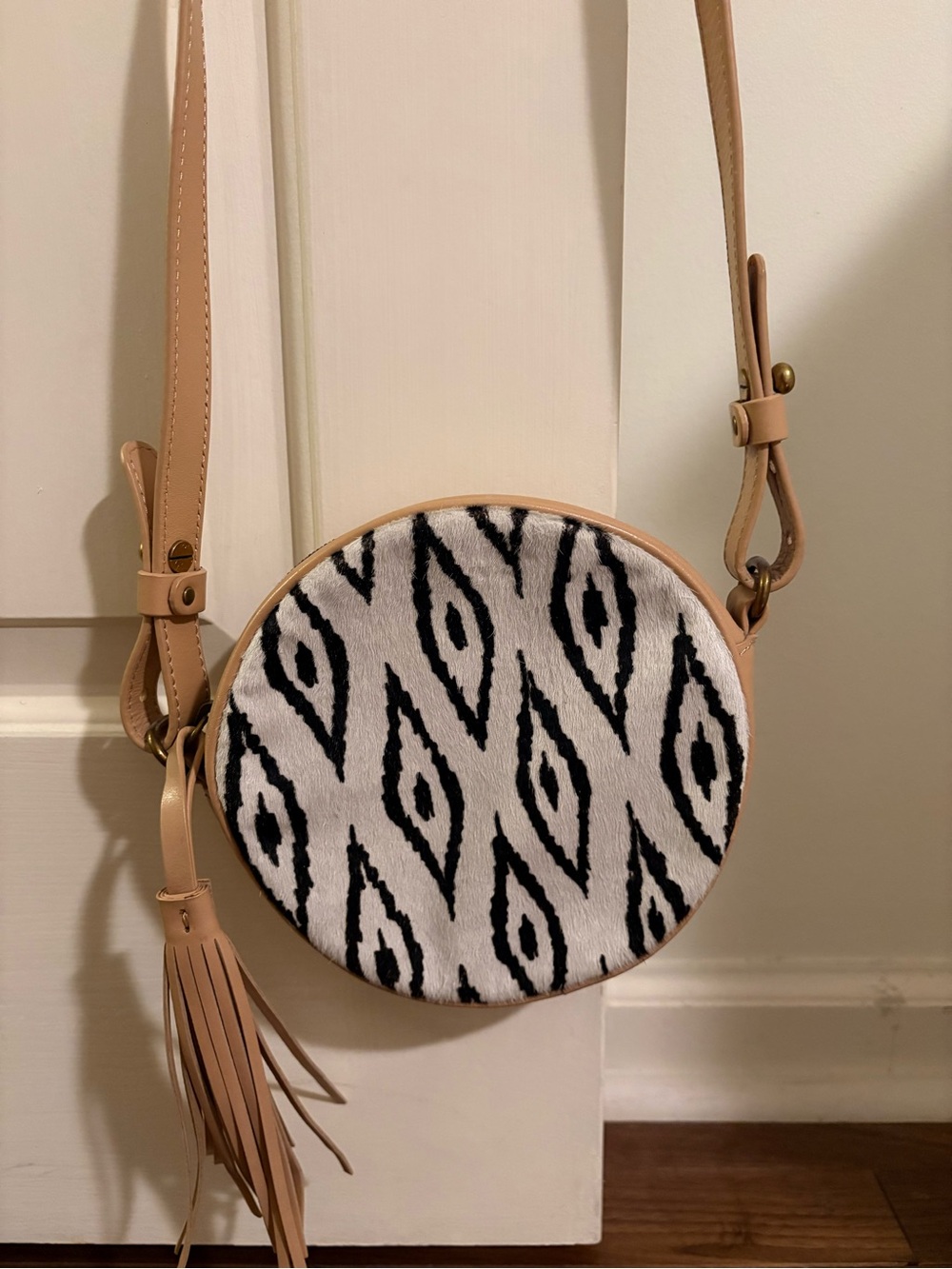 Cynthia Vincent Round Tassel Crossbody with ikat pattern